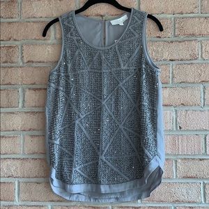 Amazing beaded detail on this grey tank top